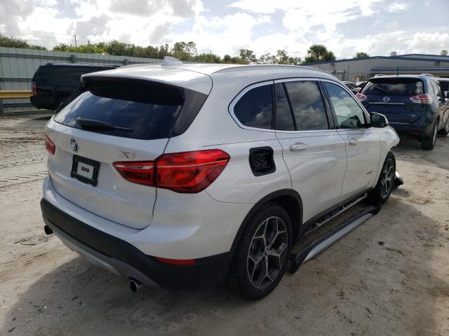 Photo 3 VIN: WBXHT3C3XH5F87569 - BMW X1 XDRIVE2 