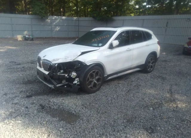 Photo 1 VIN: WBXHT3C3XJ3H30019 - BMW X1 