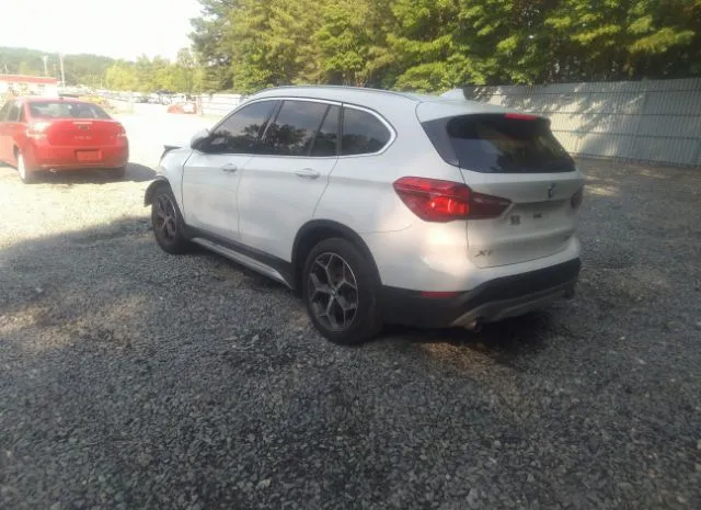 Photo 2 VIN: WBXHT3C3XJ3H30019 - BMW X1 