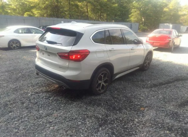 Photo 3 VIN: WBXHT3C3XJ3H30019 - BMW X1 