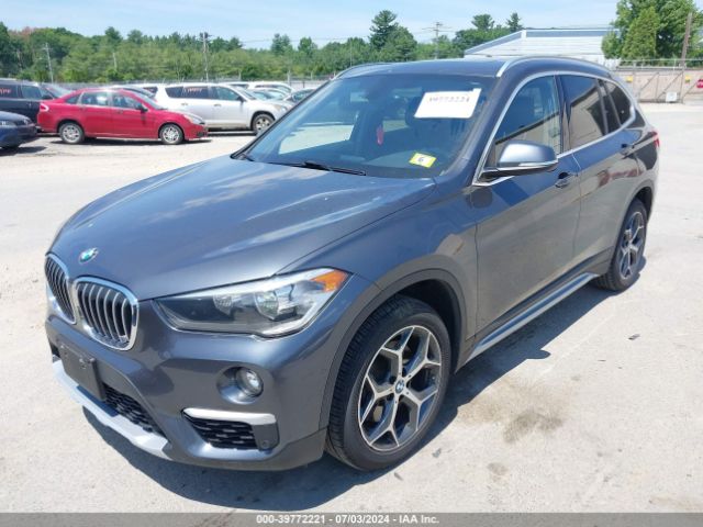 Photo 1 VIN: WBXHT3C3XJ3H32658 - BMW X1 