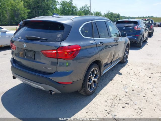 Photo 3 VIN: WBXHT3C3XJ3H32658 - BMW X1 