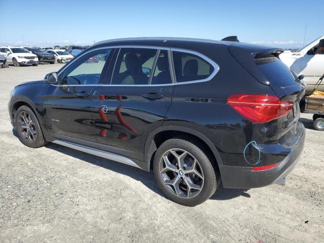 Photo 1 VIN: WBXHT3C3XJ5F89828 - BMW X1 