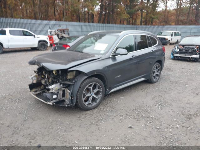 Photo 1 VIN: WBXHT3C3XJ5F90784 - BMW X1 