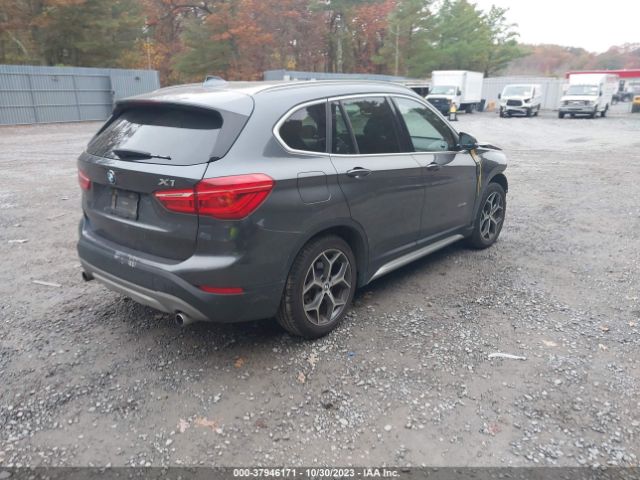 Photo 3 VIN: WBXHT3C3XJ5F90784 - BMW X1 