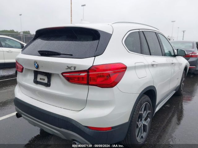 Photo 3 VIN: WBXHT3C3XJ5L24808 - BMW X1 