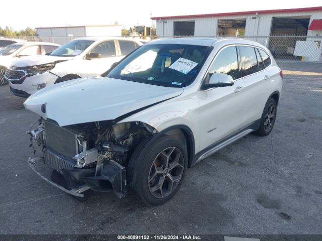 Photo 1 VIN: WBXHT3C3XJ5L25098 - BMW X1 