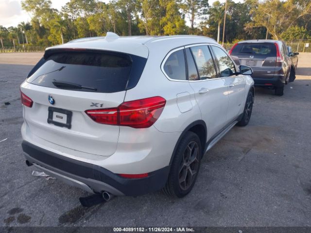 Photo 3 VIN: WBXHT3C3XJ5L25098 - BMW X1 