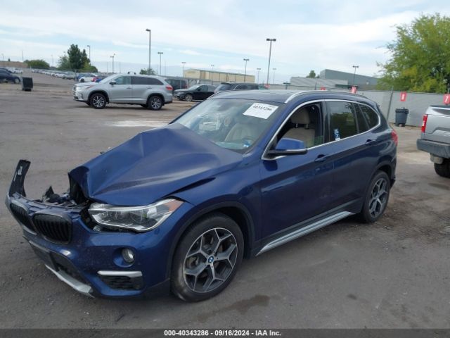 Photo 1 VIN: WBXHT3C3XJ5L28227 - BMW X1 