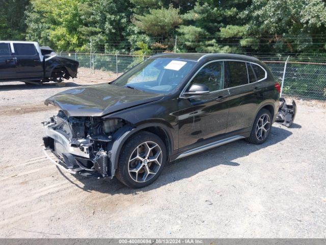 Photo 1 VIN: WBXHT3C50K3H34289 - BMW X1 