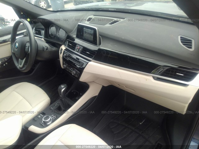 Photo 4 VIN: WBXHT3C50K5L91260 - BMW X1 