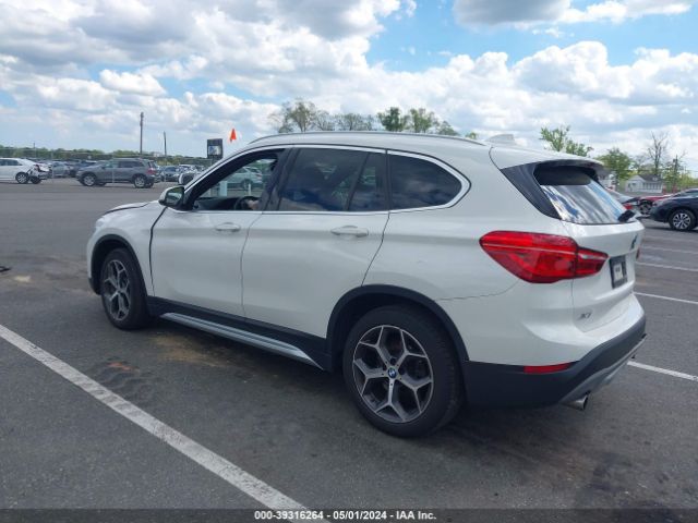 Photo 2 VIN: WBXHT3C51K3H35287 - BMW X1 