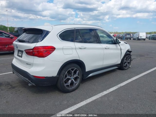 Photo 3 VIN: WBXHT3C51K3H35287 - BMW X1 