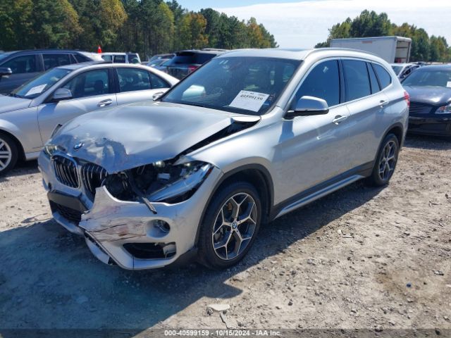 Photo 1 VIN: WBXHT3C51K5L90585 - BMW X1 