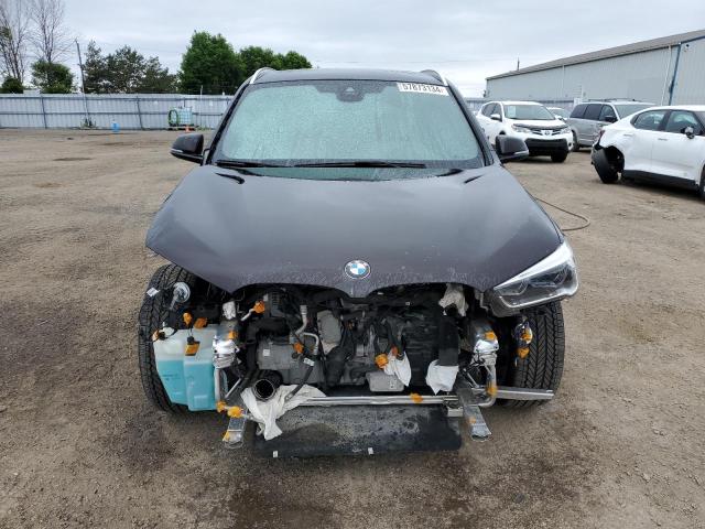 Photo 4 VIN: WBXHT3C51K5L90697 - BMW X1 