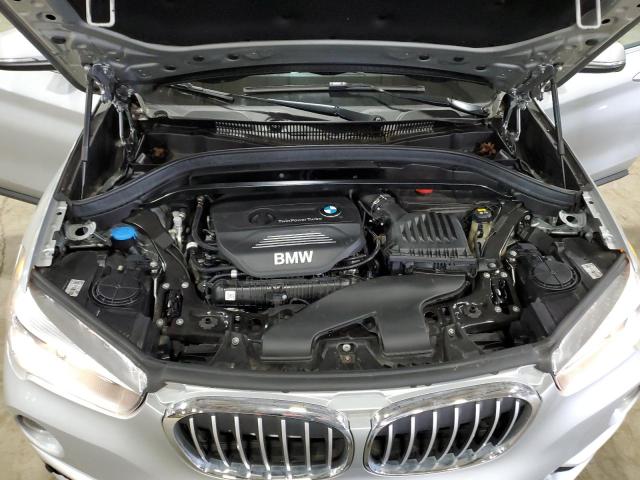 Photo 11 VIN: WBXHT3C52K3H35802 - BMW X1 