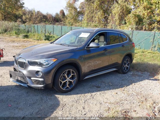 Photo 1 VIN: WBXHT3C52K5L36955 - BMW X1 