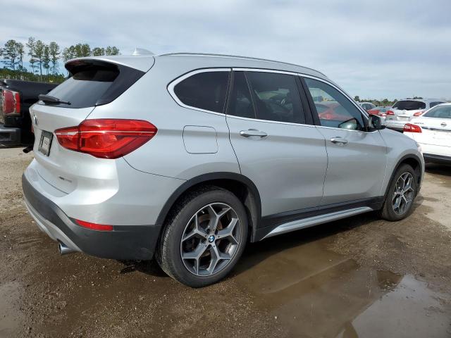 Photo 2 VIN: WBXHT3C52K5L91339 - BMW X1 