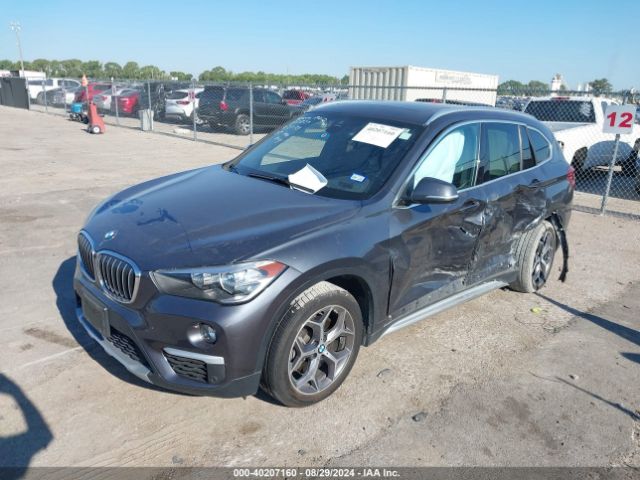 Photo 1 VIN: WBXHT3C52K5N00284 - BMW X1 