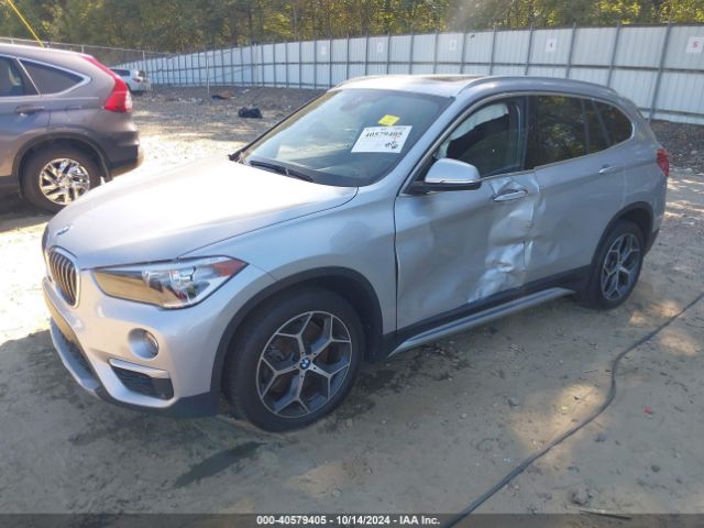 Photo 1 VIN: WBXHT3C53K5L37192 - BMW X1 