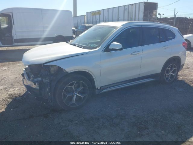 Photo 1 VIN: WBXHT3C53K5L89891 - BMW X1 