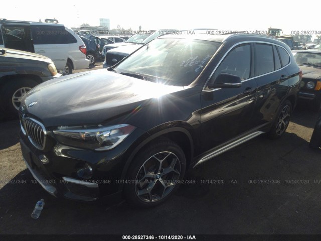 Photo 1 VIN: WBXHT3C54K5L37475 - BMW X1 