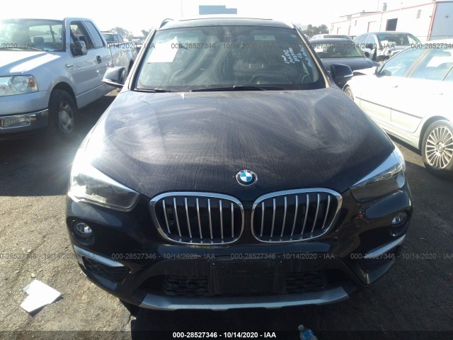 Photo 5 VIN: WBXHT3C54K5L37475 - BMW X1 