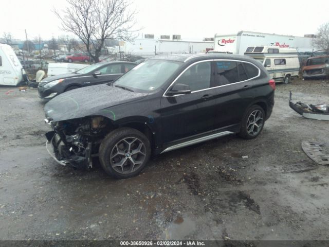 Photo 1 VIN: WBXHT3C54K5L89334 - BMW X1 