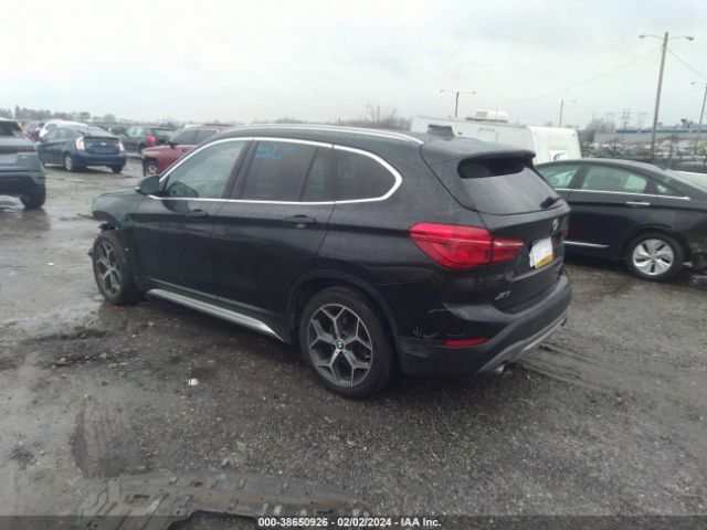 Photo 2 VIN: WBXHT3C54K5L89334 - BMW X1 