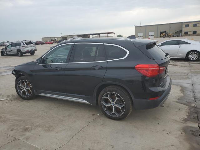 Photo 1 VIN: WBXHT3C54K5N19452 - BMW X1 