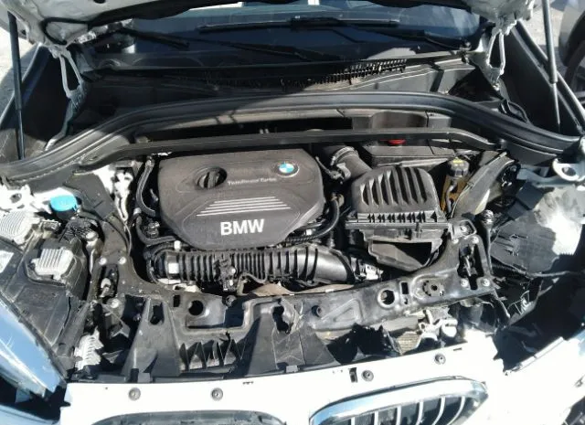 Photo 9 VIN: WBXHT3C54K5N38700 - BMW X1 