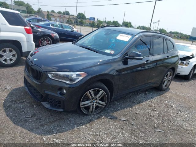 Photo 1 VIN: WBXHT3C55K3H35308 - BMW X1 