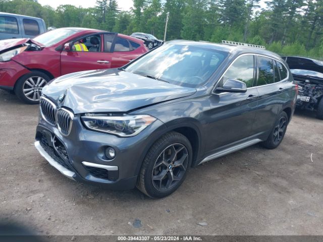 Photo 1 VIN: WBXHT3C55K3H36376 - BMW X1 