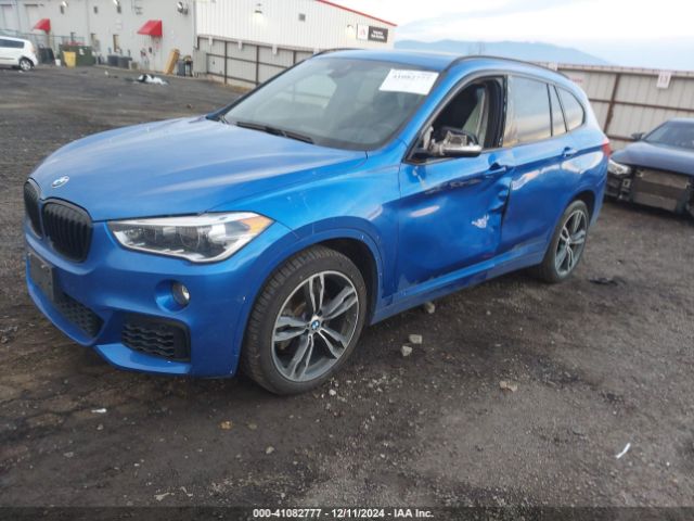 Photo 1 VIN: WBXHT3C55K5L91061 - BMW X1 