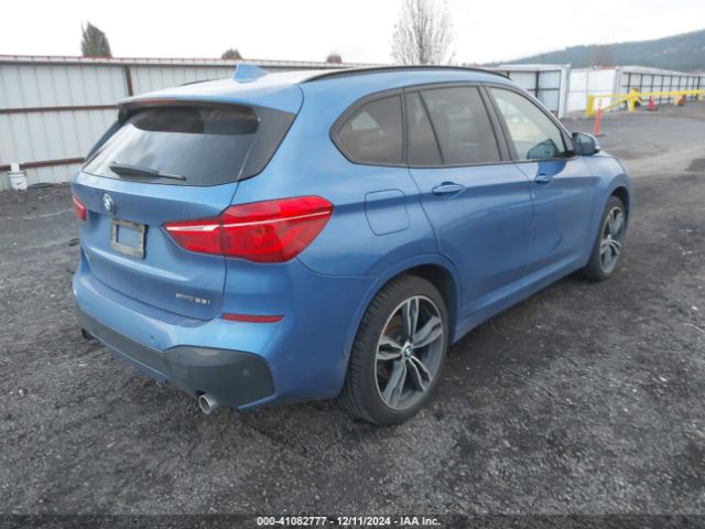 Photo 3 VIN: WBXHT3C55K5L91061 - BMW X1 