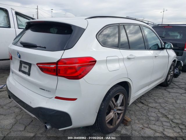 Photo 3 VIN: WBXHT3C56K3H34006 - BMW X1 