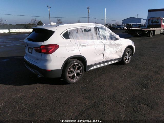 Photo 3 VIN: WBXHT3C56K3H34085 - BMW X1 