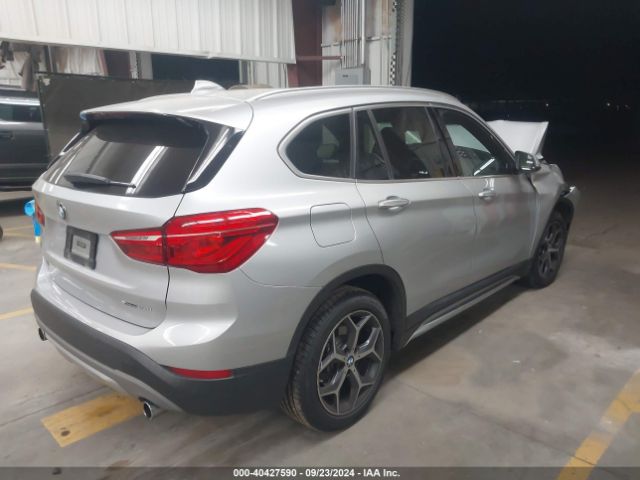 Photo 3 VIN: WBXHT3C56K3H34216 - BMW X1 