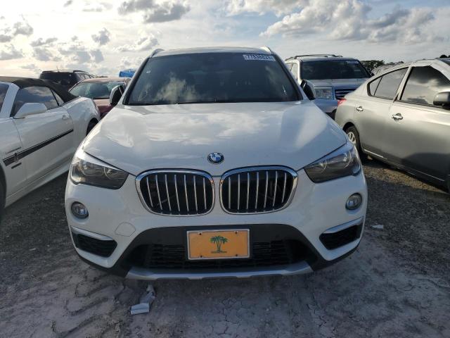 Photo 4 VIN: WBXHT3C56K5L35906 - BMW X1 