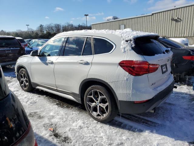 Photo 1 VIN: WBXHT3C57K3H36489 - BMW X1 