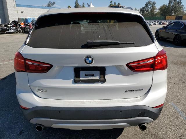 Photo 5 VIN: WBXHT3C57K5L37163 - BMW X1 XDRIVE2 