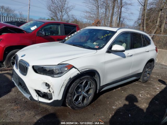 Photo 1 VIN: WBXHT3C57K5L37955 - BMW X1 