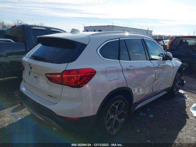 Photo 3 VIN: WBXHT3C57K5L37955 - BMW X1 