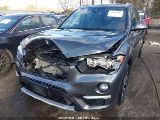 Photo 5 VIN: WBXHT3C57K5L91403 - BMW X1 