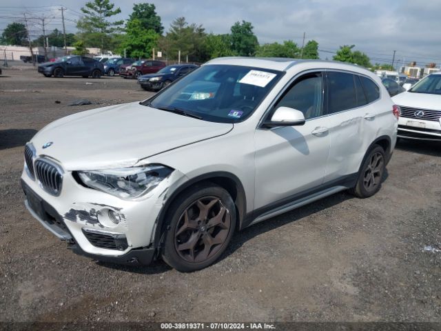 Photo 1 VIN: WBXHT3C57K5L91546 - BMW X1 