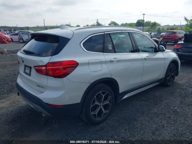 Photo 3 VIN: WBXHT3C57K5L91546 - BMW X1 