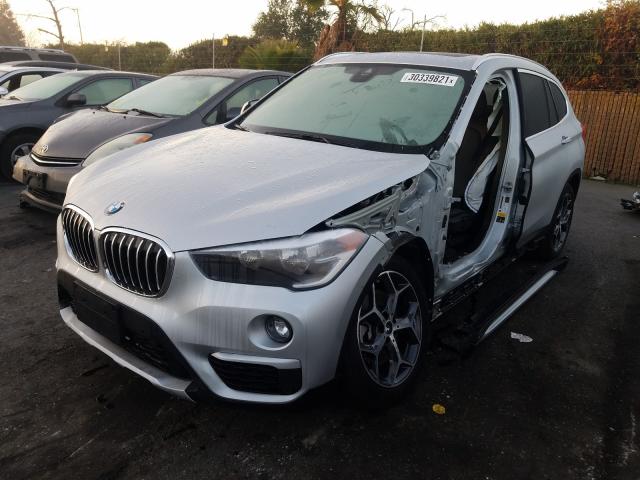 Photo 1 VIN: WBXHT3C58K3H34203 - BMW X1 