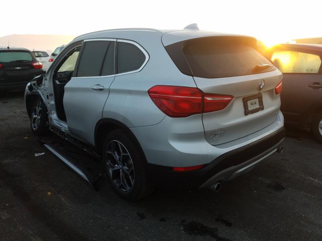 Photo 2 VIN: WBXHT3C58K3H34203 - BMW X1 