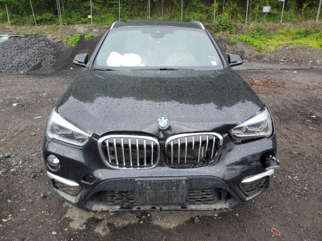 Photo 4 VIN: WBXHT3C58K5L35907 - BMW X1 XDRIVE2 