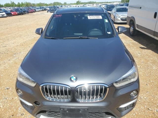 Photo 4 VIN: WBXHT3C58K5L91099 - BMW X1 